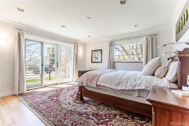 bedroom with light wood-style flooring, baseboards, ornamental molding, access to exterior, and recessed lighting