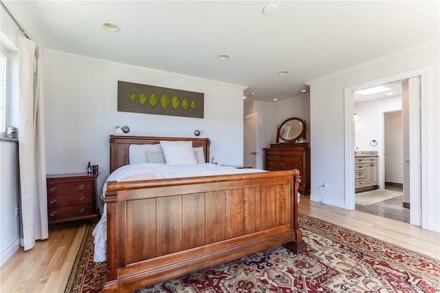 bedroom featuring light wood-type flooring, baseboards, recessed lighting, and ornamental molding