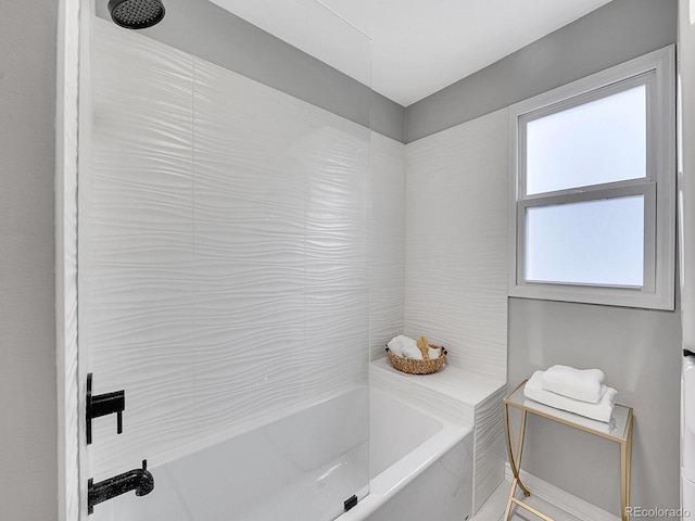 bathroom featuring a shower and a bath