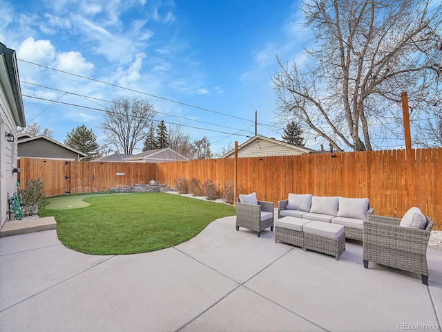 view of patio with a fenced backyard and an outdoor living space