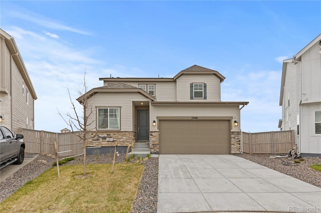 13446 Amber Sky St, Parker, CO 80134 - view of front of property featuring fence, driveway, an attached garage, and stone siding