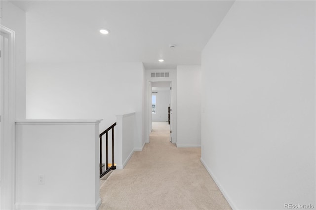 13446 Amber Sky St, Parker, CO 80134 - hallway with an upstairs landing, light carpet, recessed lighting, and baseboards