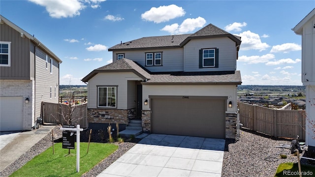 13446 Amber Sky St, Parker, CO 80134 - view of front facade featuring an attached garage, fence, roof with shingles, concrete driveway, and stone siding