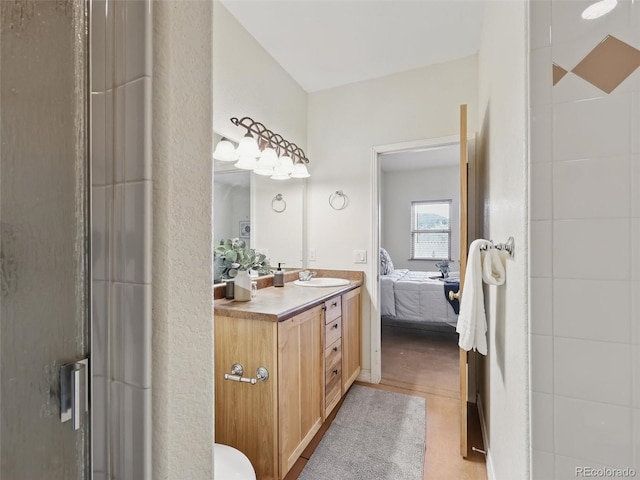 ensuite bathroom featuring vanity