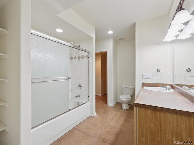 bathroom with tile patterned flooring, toilet, vanity, recessed lighting, and shower / bath combination with glass door