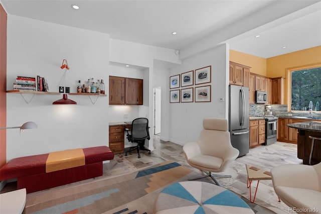 103 Trout Run Dr, Carbondale, CO 81623 - living area featuring recessed lighting and built in study area