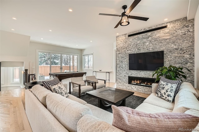 living room with a ceiling fan, wood finished floors, pool table, a fireplace, and recessed lighting