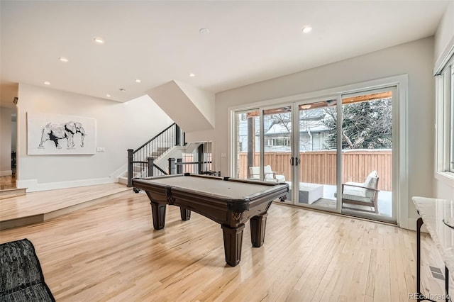 recreation room featuring light wood-type flooring, french doors, baseboards, and recessed lighting