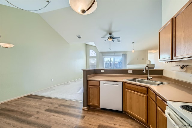 kitchen with lofted ceiling, sink, white appliances, ceiling fan, and light hardwood / wood-style floors