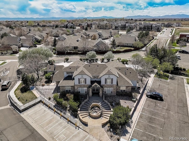 aerial view featuring a mountain view and a residential view