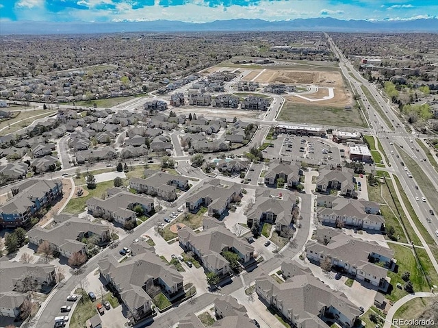 birds eye view of property featuring a residential view and a mountain view