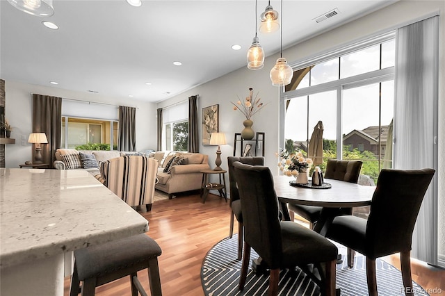 10152 Bluffmont Ln, Lone Tree, CO 80124 - dining area featuring light wood finished floors and recessed lighting