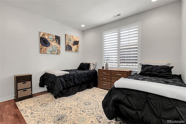 10152 Bluffmont Ln, Lone Tree, CO 80124 - bedroom featuring wood finished floors and recessed lighting