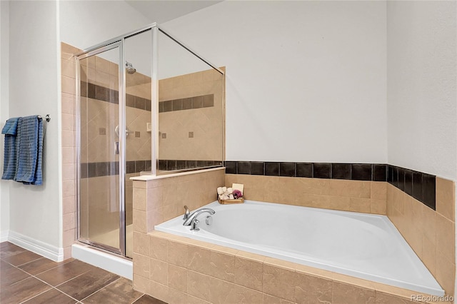 10152 Bluffmont Ln, Lone Tree, CO 80124 - bathroom featuring a bath and a shower stall