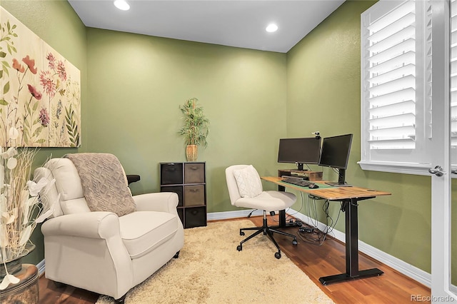 10152 Bluffmont Ln, Lone Tree, CO 80124 - office with wood finished floors and recessed lighting