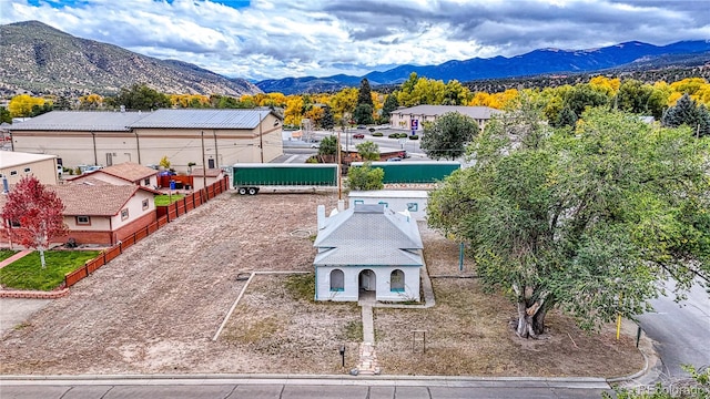 drone / aerial view featuring a mountain view