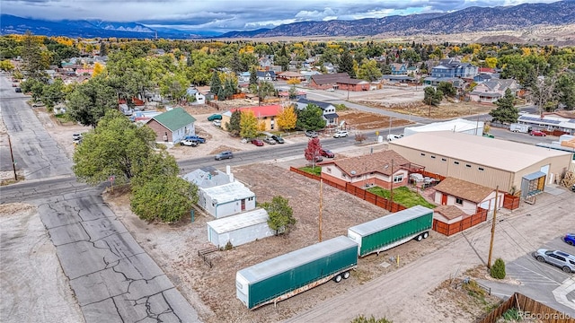 drone / aerial view featuring a mountain view