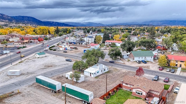 drone / aerial view featuring a mountain view