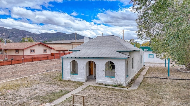 view of front facade featuring a mountain view