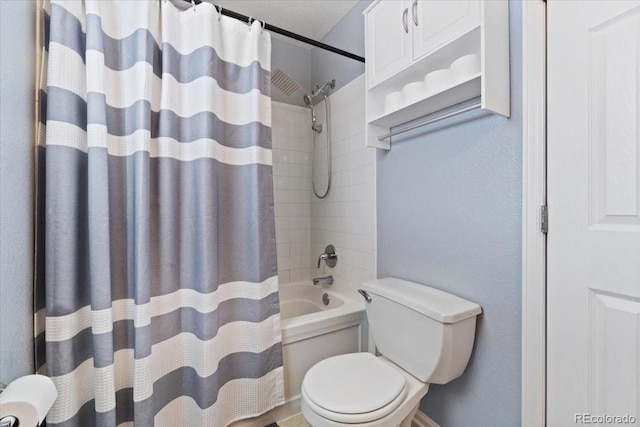 bathroom with toilet and shower / tub combo