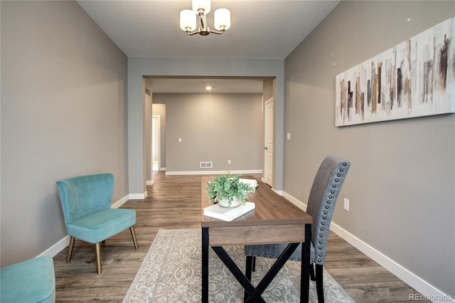 4090 Forever Cir, Castle Rock, CO 80109 - office space with a chandelier, wood finished floors, and baseboards