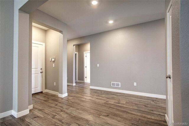 4090 Forever Cir, Castle Rock, CO 80109 - empty room with wood finished floors, baseboards, and recessed lighting