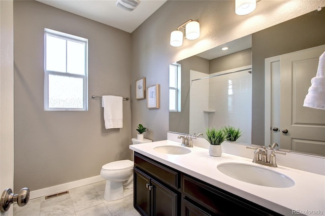 4090 Forever Cir, Castle Rock, CO 80109 - bathroom featuring toilet, double vanity, baseboards, and tiled shower