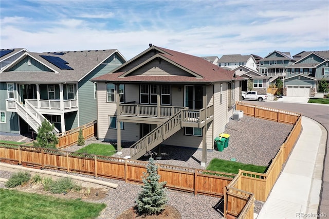 4090 Forever Cir, Castle Rock, CO 80109 - view of property with stairway, a residential view, and a fenced backyard