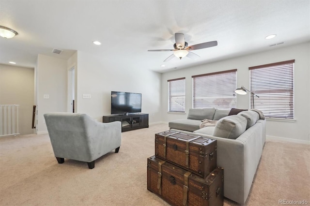 living room with a wealth of natural light and light carpet