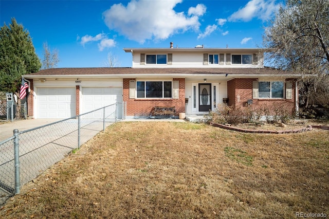 view of front of property with brick siding, concrete driveway, an attached garage, a front yard, and fence