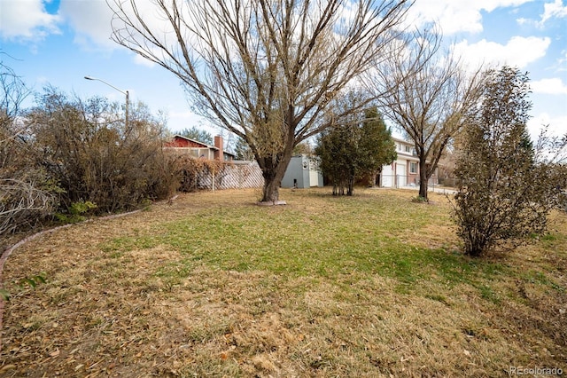 view of yard featuring fence