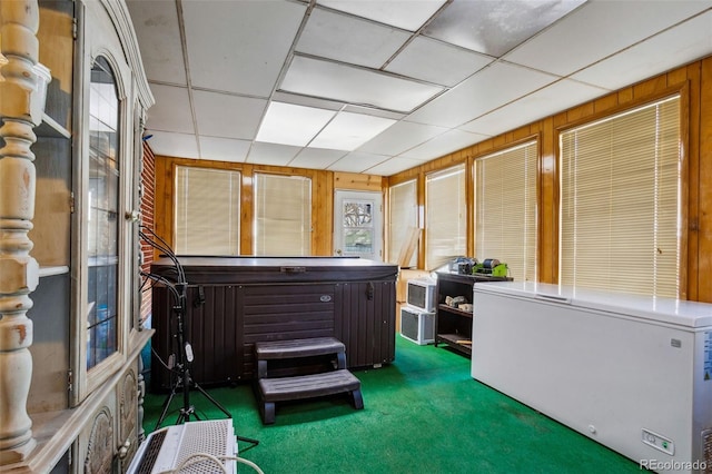 sunroom / solarium with a drop ceiling