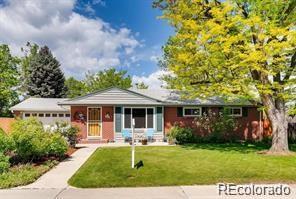 7005 S Ash Cir, Centennial, CO 80122 - ranch-style house with a front yard and an attached garage