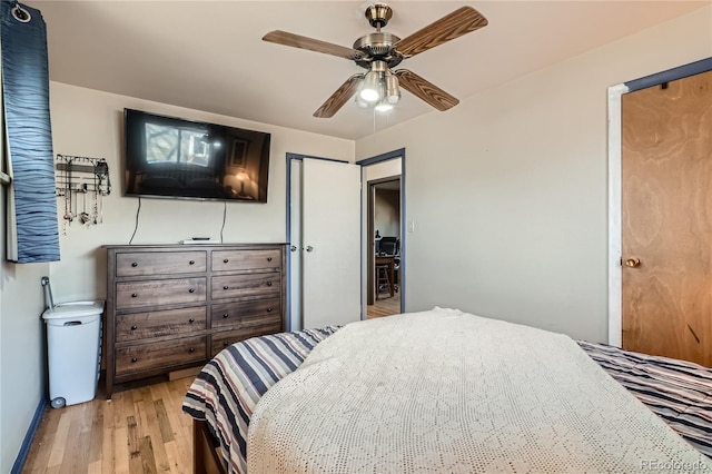 7005 S Ash Cir, Centennial, CO 80122 - bedroom featuring light wood-style flooring and ceiling fan