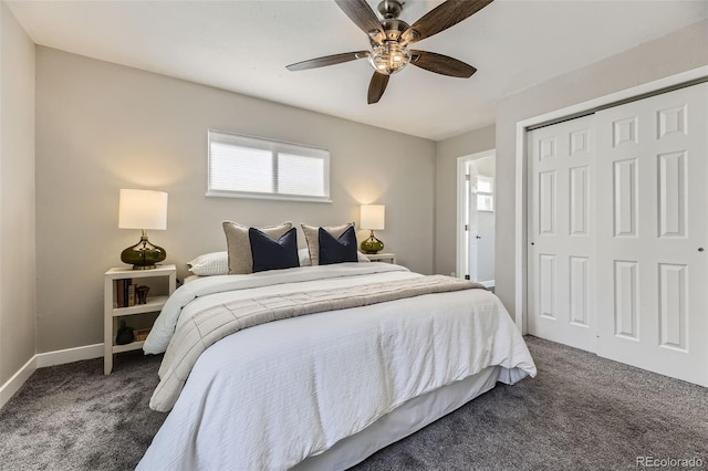 carpeted bedroom with ceiling fan, a closet, and baseboards