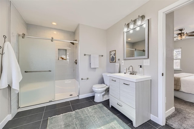 full bath with toilet, ceiling fan, a shower stall, vanity, and tile patterned floors