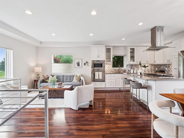 2945 E 26th Avenue Parkway, Denver, CO 80205 - living area featuring dark wood finished floors and recessed lighting