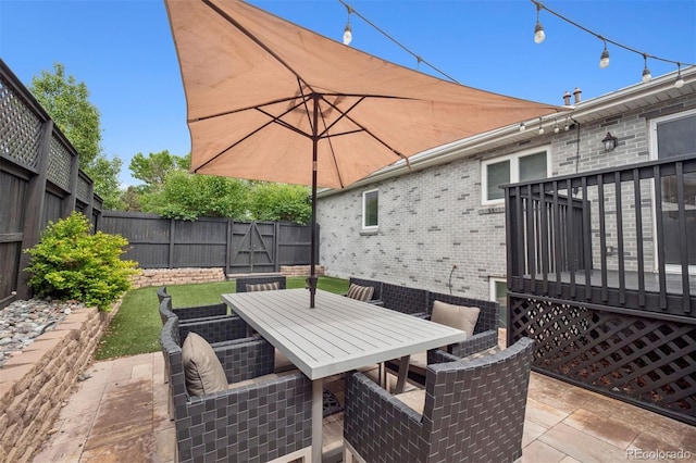 2945 E 26th Avenue Parkway, Denver, CO 80205 - fenced backyard featuring outdoor dining area, a patio, and a wooden deck