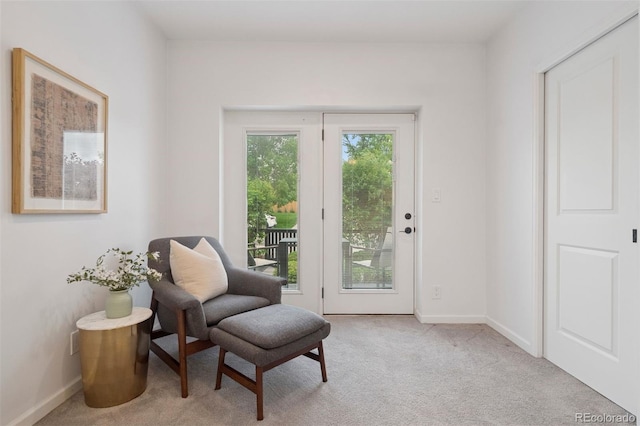 2945 E 26th Avenue Parkway, Denver, CO 80205 - living area featuring light colored carpet and baseboards