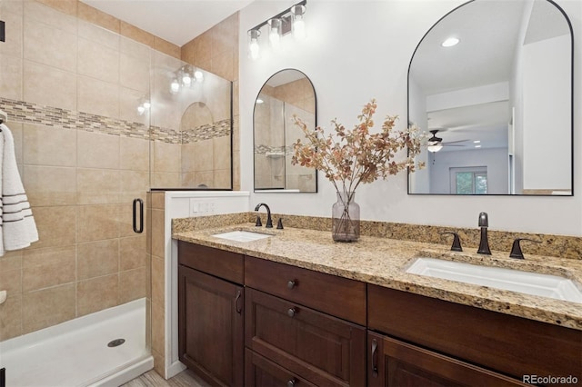 2945 E 26th Avenue Parkway, Denver, CO 80205 - bathroom featuring double vanity, a stall shower, and ceiling fan