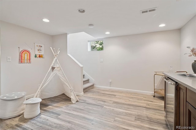 2945 E 26th Avenue Parkway, Denver, CO 80205 - game room with light wood finished floors, beverage cooler, recessed lighting, and baseboards