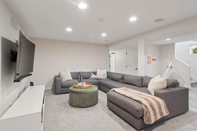 2945 E 26th Avenue Parkway, Denver, CO 80205 - living area featuring recessed lighting, baseboards, and light carpet