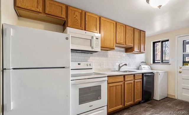 1410 S Ash St, Denver, CO 80222 - kitchen featuring brown cabinetry, backsplash, a sink, light countertops, and white appliances