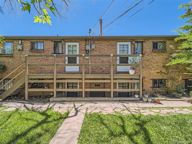 1410 S Ash St, Denver, CO 80222 - back of property featuring brick siding and a balcony