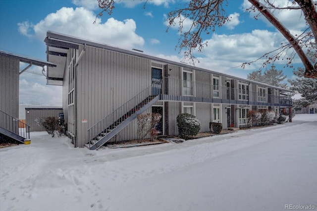 view of snow covered property