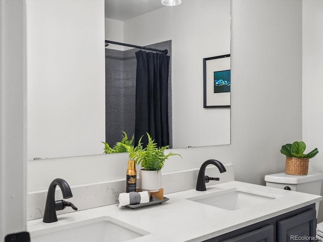 7379 S Gore Range Rd Unit 304, Littleton, CO 80127 - bathroom with double vanity and curtained shower