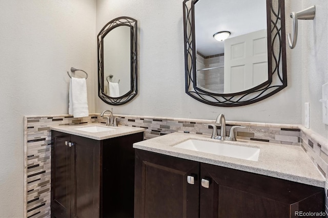 bathroom with tile walls and vanity