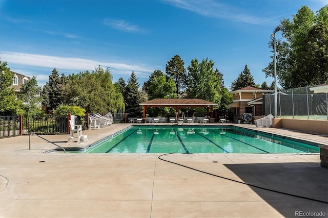 view of pool with a patio area and a gazebo