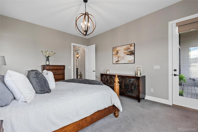 bedroom featuring access to exterior, a notable chandelier, baseboards, and carpet