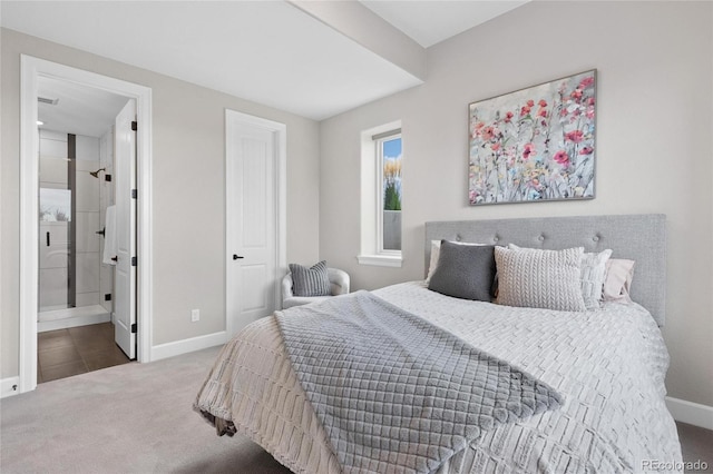 bedroom featuring carpet flooring, connected bathroom, and baseboards